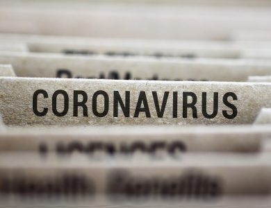 Coronavirus written on file folder label